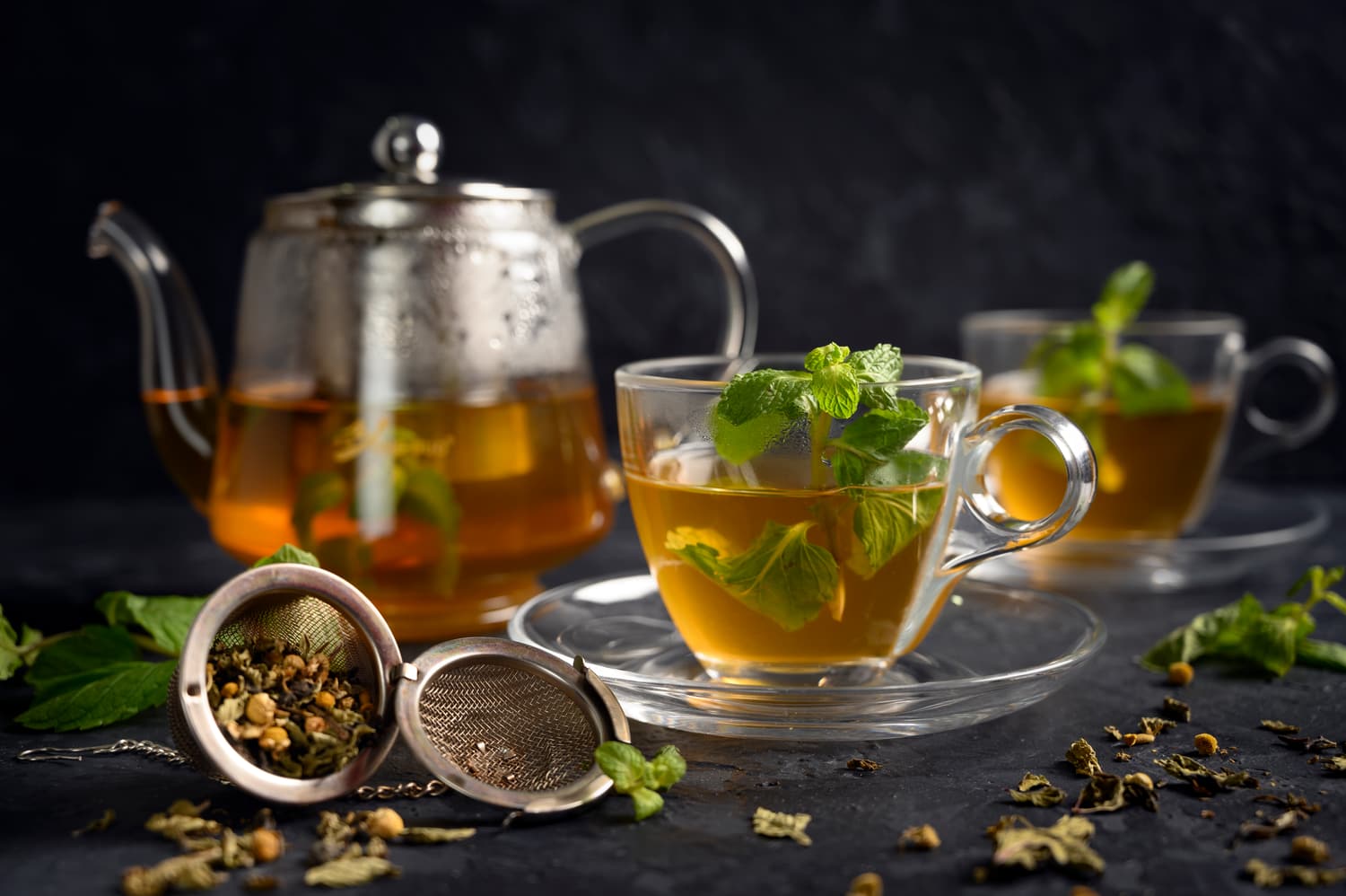 Mint tea being poured in a Moroccan glass