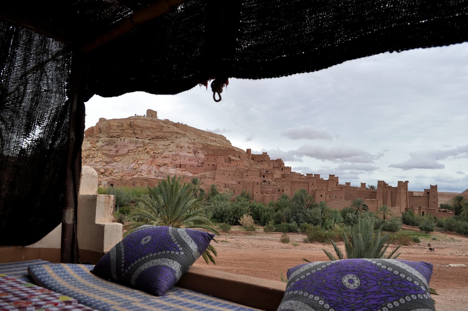 View across the Ounila valley to the ksar of Aït Benhaddou from a terrace restaurant